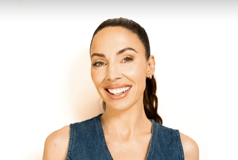 A smiling headshot of Whitney Cummings.